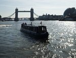 A narrowboat navigates the Thames