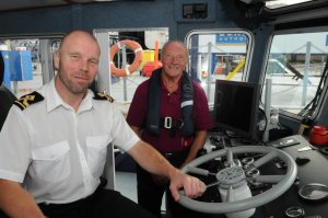 Cllr Derek Sales with the PLA's John Studd onboard the PLA launch