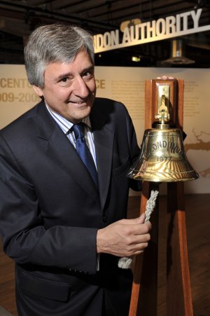 Jim Fitzpatrick sounds the bell to open the Exhibition