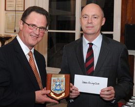 PLA chief harbour master (left) David Phillips presenting rowing safety award